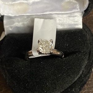 Diamond solitaire ring with .76 carat Rock.